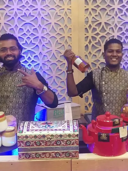 Our bartenders fully embrace the theme, seen here in traditional attire for a Sufi-themed event. We believe the team's appearance is just as important as the bar's decor.