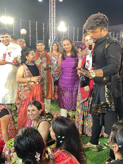 Interacting with the prize winners at Raasleela Navratri.