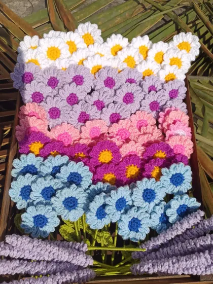Another view of the crate filled with daisy and lavender stems.