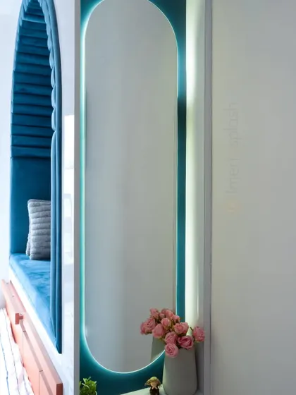 A detail shot of a glamorous dressing table with a backlit mirror, perfect for elevating a daily routine.
