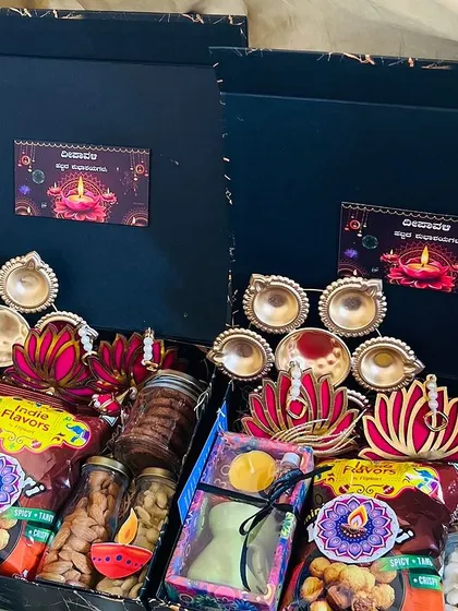 A clear, top-down view of the two black Diwali gift boxes, perfect for showing clients the exact contents.