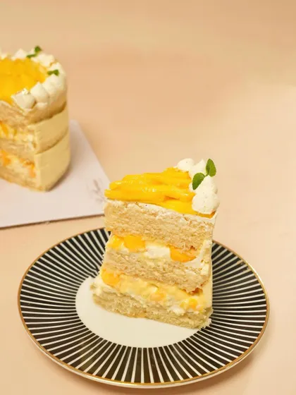 A slice of pure summer. My Mango Vanilla Cream Cake is the perfect way to enjoy the season's best fruit.