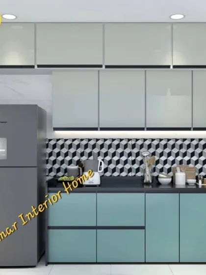 A close-up of the blue-green and white kitchen cabinets with a bold 3D-effect backsplash.