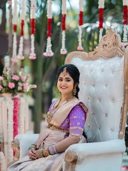 A full portrait from a beautiful baby shower. The client is seated on a ceremonial chair, looking absolutely radiant in her traditional saree and my signature dewy makeup.