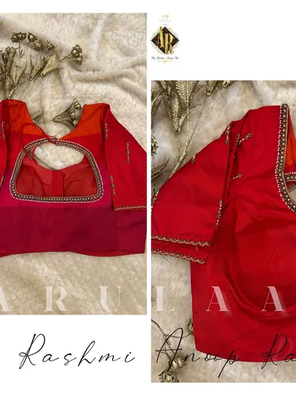 A simple red blouse with a keyhole cutout at the back. The neckline and sleeve cuffs are finished with a minimal line of beadwork.