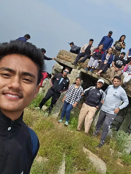 A selfie capturing the whole group on a rocky outcrop. These are the fun, candid moments that define my trips.