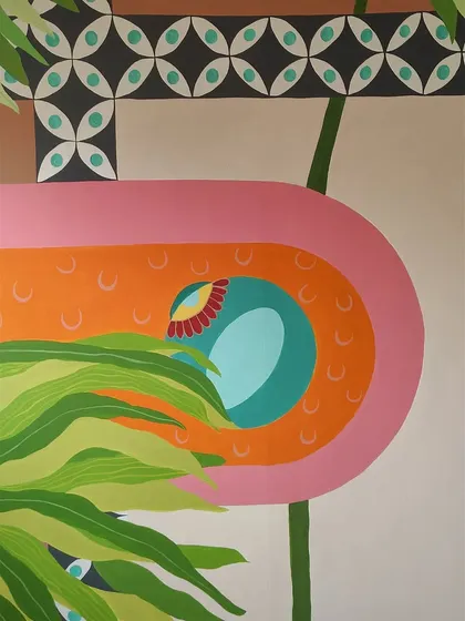 A detail shot of the abstract elements, with their clean lines and vibrant colors peeking through the leaves.
