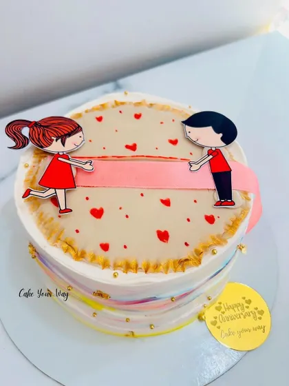 One of my most trending designs. This ribbon-pull cake reveals a hidden message, perfect for anniversaries and birthdays.