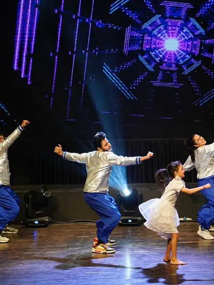 The group in a moment of joyful celebration during their Bollywood performance at Zest 25.