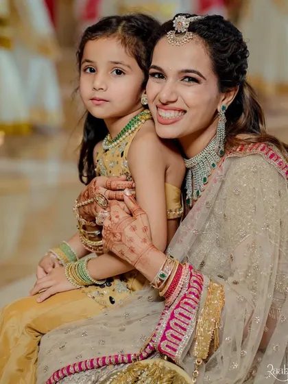 The sister of the bride with her adorable daughter. I created a fresh and pretty makeup look for her to enjoy her sister's phera ceremony.