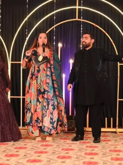 Guiding the couple through a fun game on their Sangeet night. My goal is to create lighthearted, joyful interactions that become cherished memories for the bride and groom.