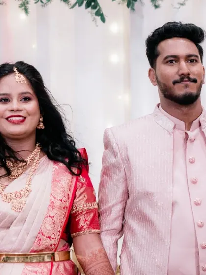 A happy couple making their entrance at their reception. We capture the energy and smiles as you celebrate with your friends and family.