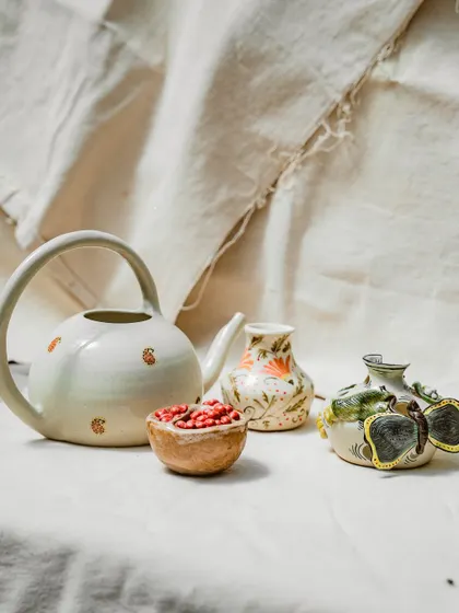 The results of our students' dedication speak for themselves. This collection, featuring a beautifully crafted teapot, a pomegranate bowl, and other unique pieces, showcases the diverse and imaginative work that comes out of our Foundation Course. Each piece tells a story of experimentation and personal expression.