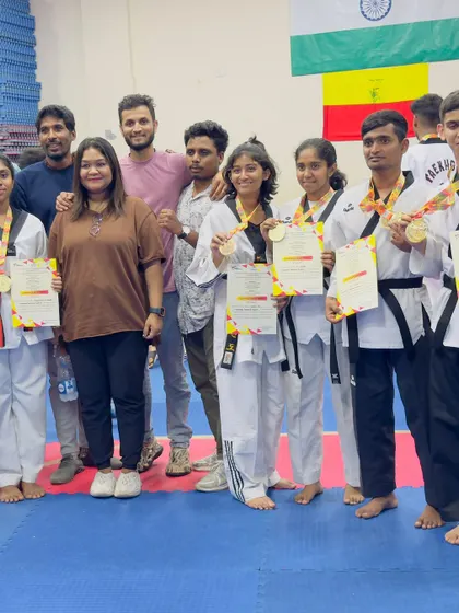 More of our champions posing with their well earned medals. Their smiles show the satisfaction that comes from hard work paying off.