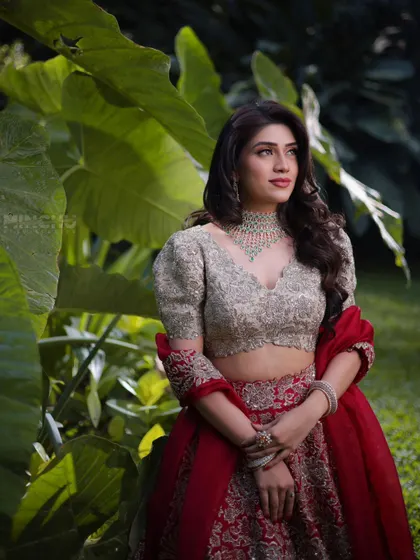 Mahima looking elegant and thoughtful. The makeup is soft and romantic, with a focus on enhancing her natural beauty in a very sophisticated way.