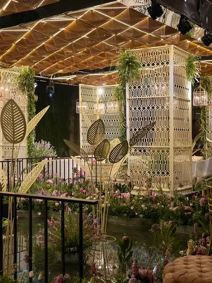 For this Mehendi sundowner, we built a custom alfresco floating island in a lotus pond. As the sun set, the illuminated ceiling and surrounding fresh flowers created a truly magical atmosphere for the celebration.