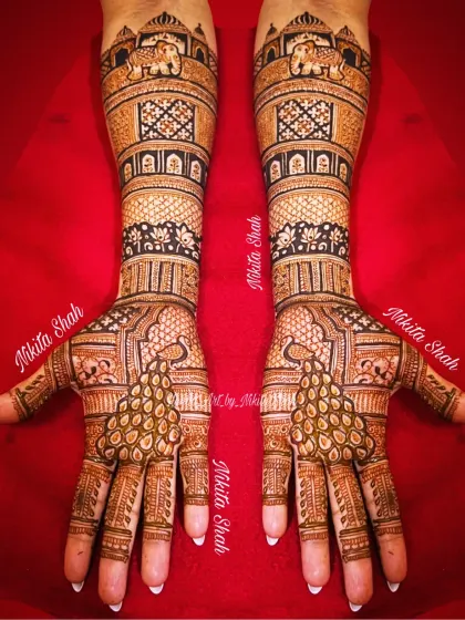This is a full-coverage bridal mehendi for a client's relative, featuring majestic elephants and graceful peacocks. I specialize in creating these dense, traditional Indian designs that are perfect for the main family members at a wedding.