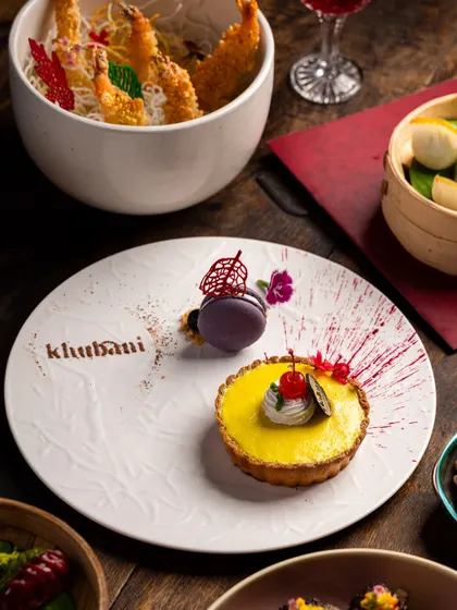 Satisfy your sweet cravings in style. Our decadent desserts, like this passionfruit tart, are as luxurious as they are delicious. The star of the show.