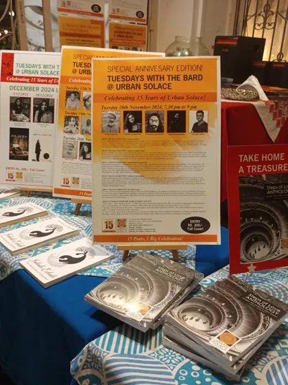 A look at our event table, set up for the 15th-anniversary celebration with posters and books, ready to welcome our community.
