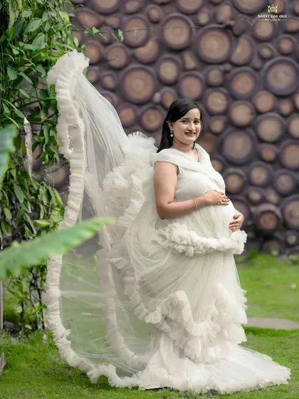 This is the moment to celebrate your beautiful journey. We love creating these dreamy, fairytale-like portraits for mothers-to-be in our private garden, using flowing gowns to add a touch of magic.