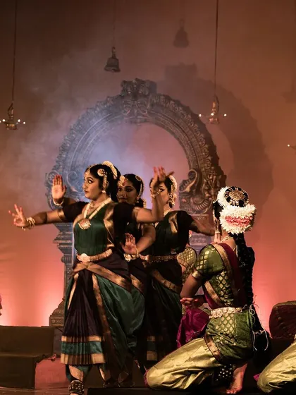 A beautiful stage composition with dancers at different levels, creating a visually appealing frame.
