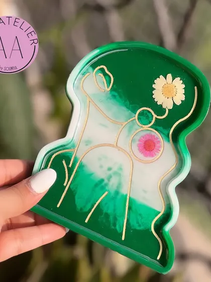 A vibrant green version of the lady trinket tray. These are perfect for adding a pop of color to your bedside table, desk, or bathroom counter.