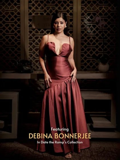 Debina Bonnerjee looks stunning in this deep red gown, perfectly complemented by Gurmeet Choudhary's dapper look. This is what we call couple goals, achieved smartly through renting.