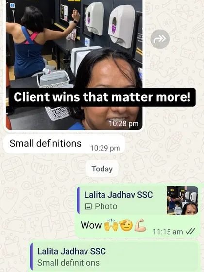 A client celebrating seeing "small definitions" in her muscles. These small wins are what build momentum and keep you going.