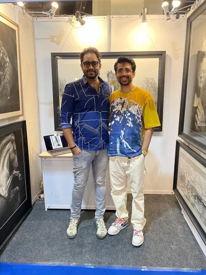 With a fellow artist and friend at my exhibition booth.