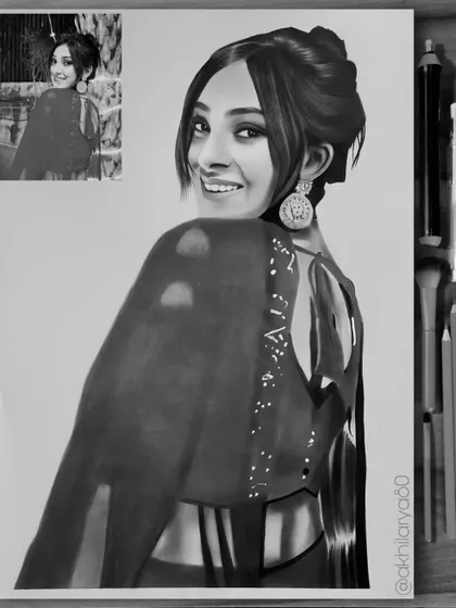 A classic black and white portrait is all about detail and emotion. For this A3 graphite sketch, I focused on capturing her bright expression and the intricate design of her blouse and earrings, creating a piece with depth and elegance.