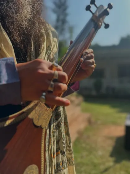 A close-up of my hands on the instrument. Each finger, each movement, contributes to the melody. Similarly, each small, disciplined action in our daily life contributes to the destiny we create.