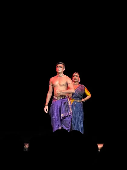 A dramatic still from 'ĀBHA' where lighting plays a crucial role. The stark contrast highlights the emotional weight of the scene, drawing the audience into the story.
