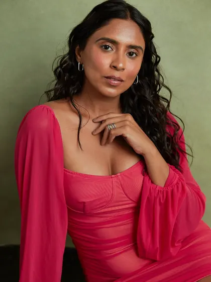 Another variation, showing how a simple shift in pose can convey a different emotion. This shot feels open and confident, adding versatility to a professional headshot collection.