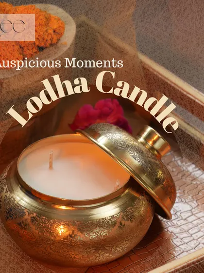Light up your auspicious moments with my Lodha Candle. The intricately designed brass container adds a touch of royalty to your festive decor.