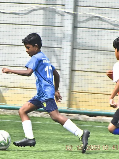 Celebrating our U-9 team's championship win at the Mega International Football Tournament. These moments of victory are what our young athletes train for.