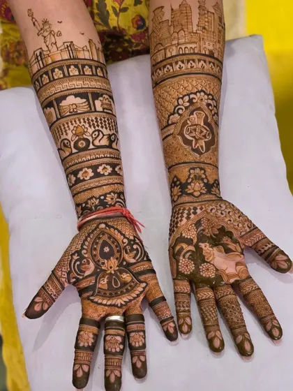 This custom bridal mehandi features a city skyline, blending modern life with traditional patterns. I can incorporate any landmark or place that is special to you and your partner.