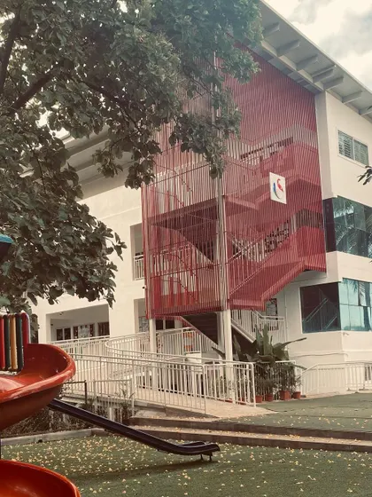 A quick-fix project involving the design of an external steel frame staircase for a school building, adding a functional and visually striking architectural element.
