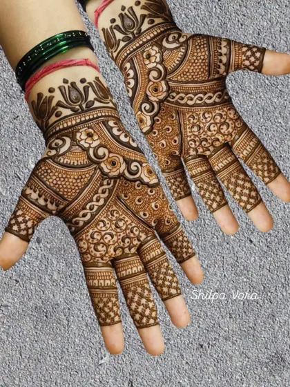 A lovely design with a mix of floral and geometric patterns, perfect for a guest or bridesmaid.