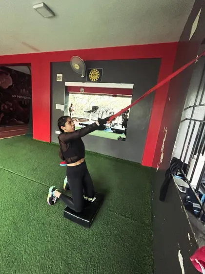 A kneeling anti-rotation press with a band, which builds core stability while simultaneously stretching the hip flexors.