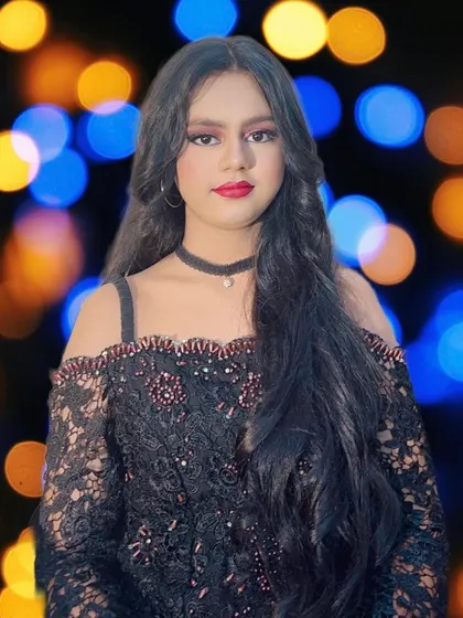 A simple yet stunning party look with classic red lips and soft waves in the hair. The focus is on flawless skin and letting the client's natural beauty shine.