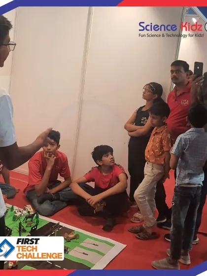 A close-up look at our students explaining their "Soul City" project during the First Tech Challenge India Championship in Pune. They worked for weeks designing, building, and programming this smart city model.