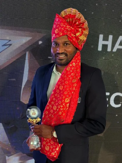 A close-up of Coach Paresh Shivalkar with his well-deserved WIFA Coach of the Year trophy. We are honored to have him as a mentor at OriGen Sports Academy.