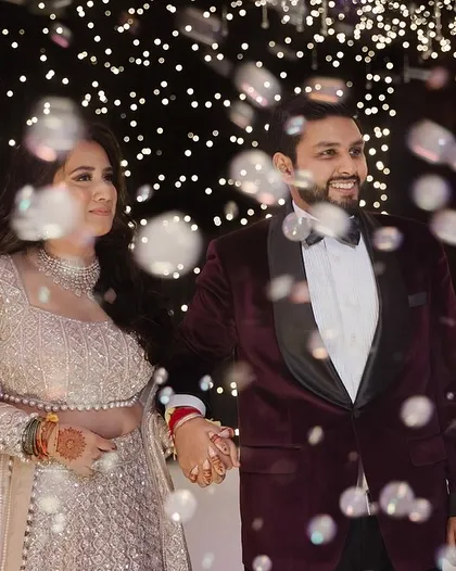 Another shot of the couple's bubble-filled Sangeet entrance, capturing their happy expressions.