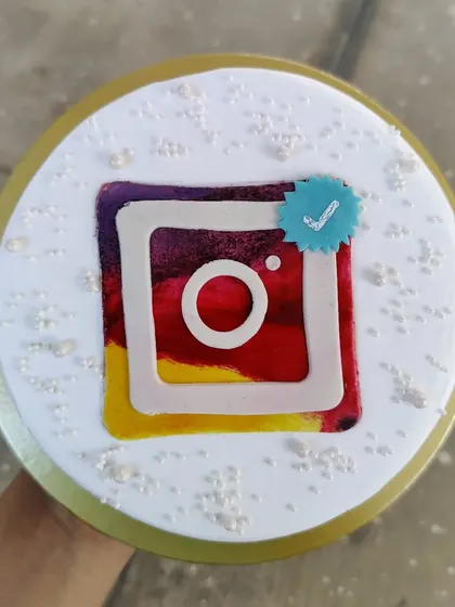 An Instagram-themed cake to celebrate getting verified. A fun and modern way to mark a social media milestone.