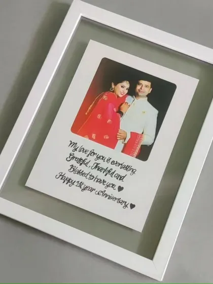 My bestseller, the floating acrylic frame. I take your favorite photo and pair it with a handwritten message, creating a beautiful illusion that your memory is suspended in air. It's a modern and meaningful way to celebrate an anniversary or any special moment.