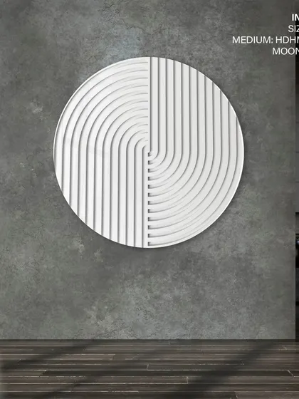 Our circular concentric abstract art in 'Moon White'. This large 47-inch piece makes a significant impact in this industrial-style room with concrete walls.
