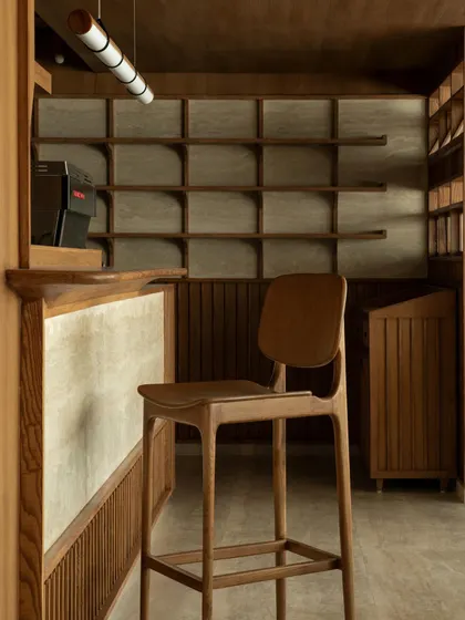 Further images from the BeWell, QBF Coffee, and Tubu projects, illustrating the consistent use of natural materials, clean lines, and thoughtful lighting to create serene and restorative commercial spaces.