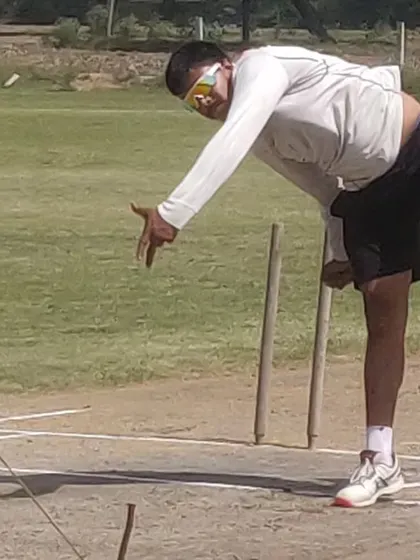 A side-on view of a bowler's follow-through. Proper completion of the action is important for both speed and injury prevention.