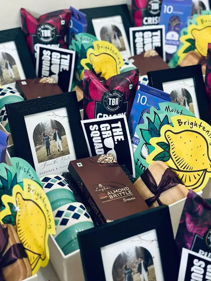 A closer look at the contents of our "Groom Squad" hampers. We include a mix of fun and practical items like face masks, snacks, a personalized photo frame, and a stylish mug.