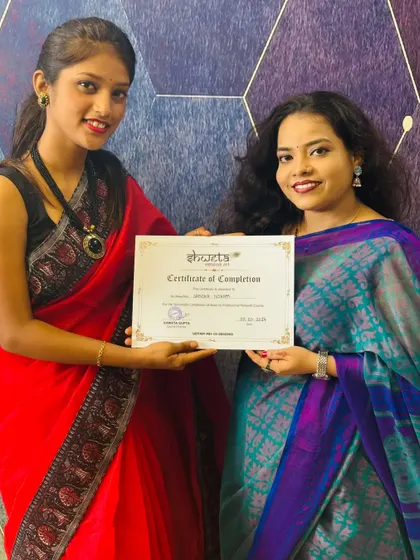 Celebrating another student's success on certificate day. I am so proud to see her complete the professional course and join my team.